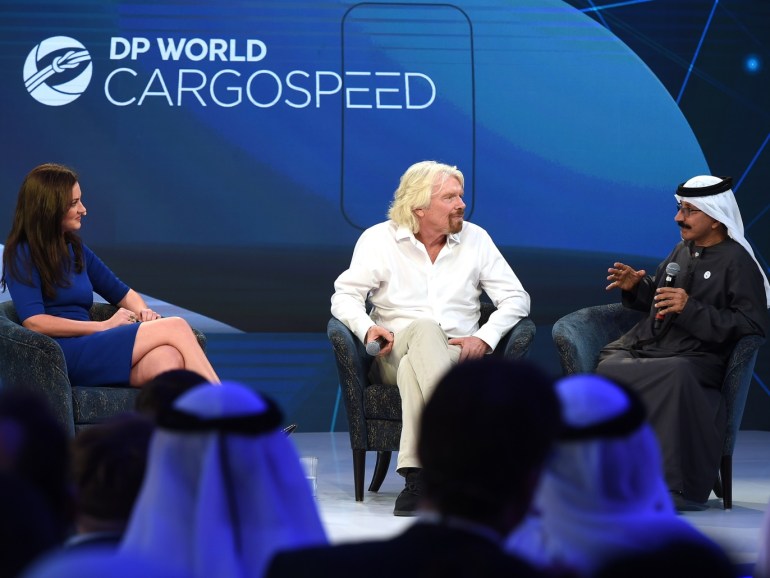 DUBAI, UNITED ARAB EMIRATES - APRIL 29: CNBC's Middle East anchor, Hadley Gamble, Sir Richard Branson, Founder, Virgin Group and Chairman, Virgin Hyperloop One and Sultan Ahmed Bin Sulayem, Group Chairman & CEO, DP World attend DP World Cargospeed launch aboard the Queen Elizabeth 2 on April 29, 2018 in Dubai, United Arab Emirates. (Photo by Tom Dulat/Getty Images for CNBC)