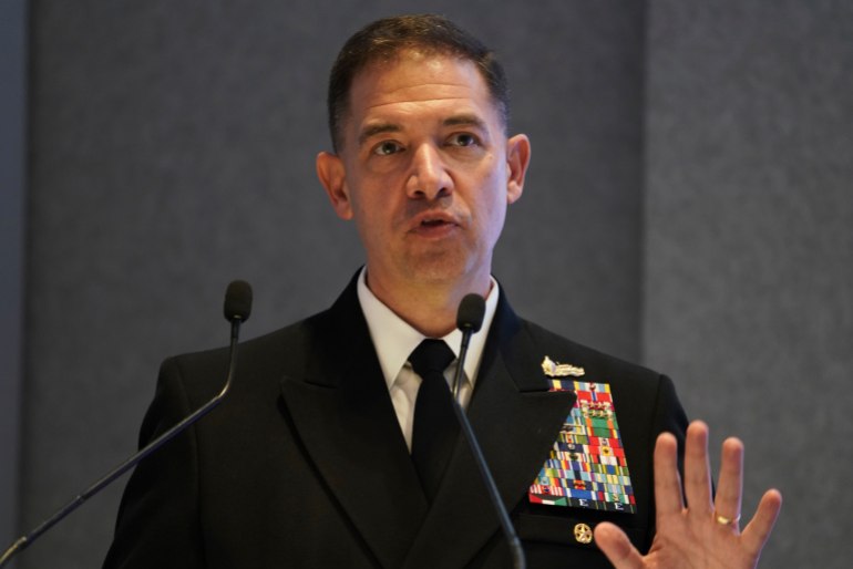 U.S. Navy Vice Adm. Brad Cooper, who heads the Navy's Bahrain-based 5th Fleet, speaks at an event at the International Defense Exhibition and Conference in Abu Dhabi, United Arab Emirates, Tuesday, Feb. 21, 2023. Iranian attacks in the waterways of the Middle East and elsewhere in the region "have the attention of everyone" as tensions rise over Tehran's advancing nuclear program, Cooper said Tuesday. (AP Photo/Jon Gambrell)