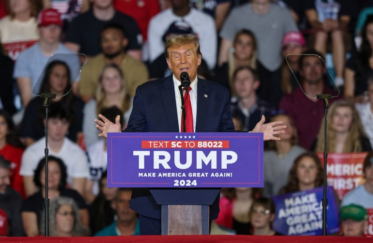 Republican presidential candidate and former U.S. President Donald Trump speaks as he holds a campaign rally at Coastal Carolina University ahead of the South Carolina Republican presidential primary in Conway, South Carolina, U.S., February 10, 2024. REUTERS/Sam Wolfe