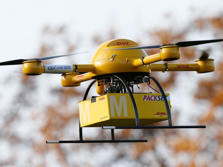 BONN, GERMANY - DECEMBER 09: A quadcopter drone arrives with a small delivery at Deutsche Post headquarters on December 9, 2013 in Bonn, Germany. Deutsche Post is testing deliveries of medicine from a pharmacy in Bonn in an examination into the viability of using drones for deliveries of small packages over short distances. U.S. online retailer Amazon has also started its intention to explore the possibilities of using drones for deliveries. (Photo by Andreas Rentz/Ge