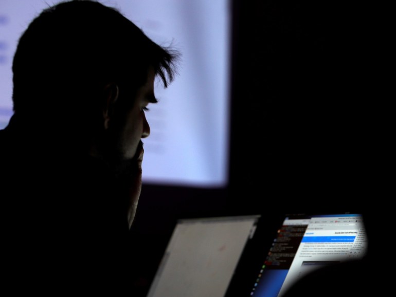 A man takes part in a hacking contest during the Def Con hacker convention in Las Vegas, Nevada, U.S. on July 29, 2017. REUTERS/Steve Marcus