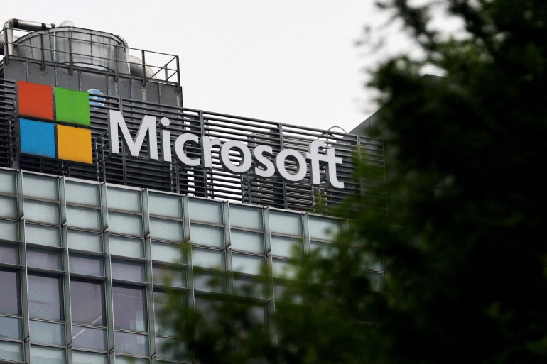 FILE PHOTO: Logo of Microsoft is pictured on its office building in Beijing