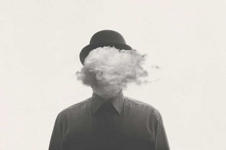 man with cloud over head, surreal black and white concept