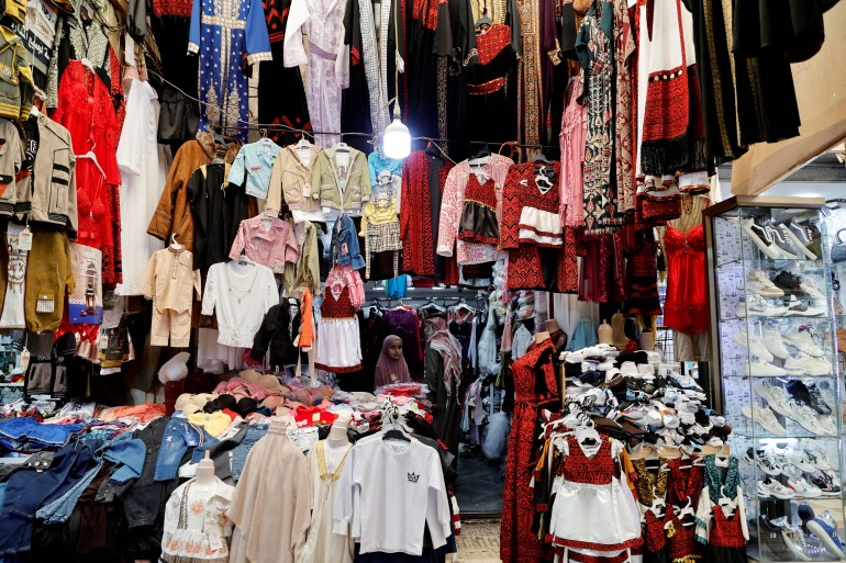 Palestinians prepare for Eid al-Fitr, amid the ongoing conflict between Israel and the Palestinian Islamist group Hamas in Gaza, in Nablus, in the Israeli-occupied West Bank, April 6, 2024. REUTERS/Raneen Sawafta