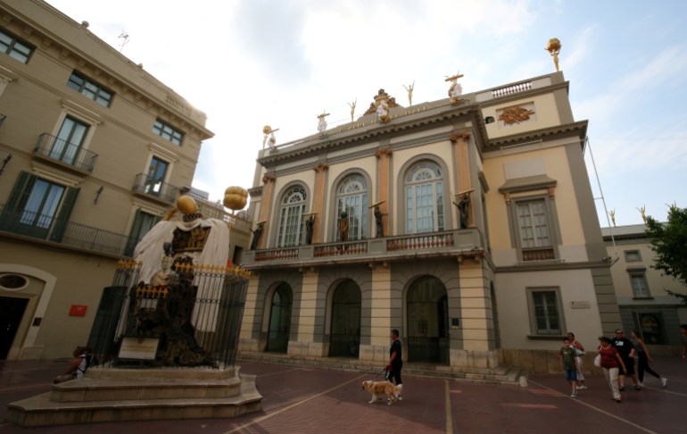 People walk around the Teatre-Museu Dali (Theatre-Museum Dali) in Figueres, north of Barcelona, Spain July 13, 2017. REUTERS/Albert Gea