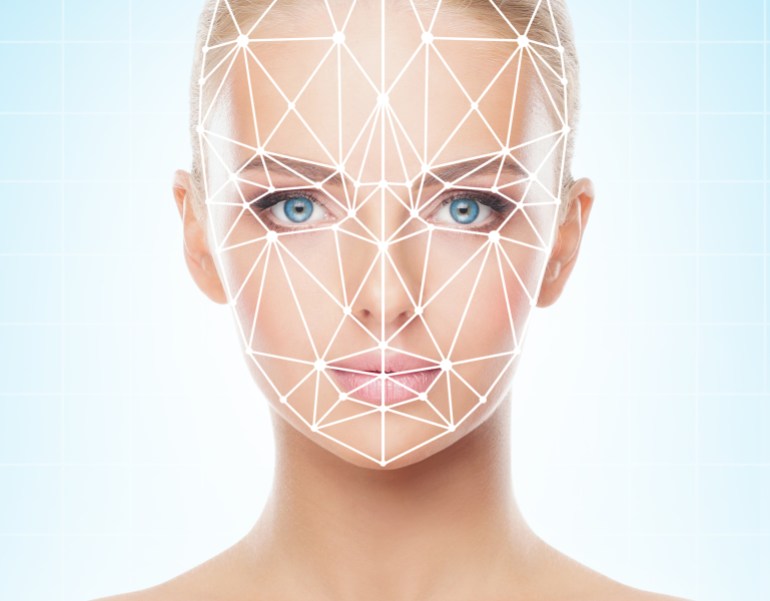 Portrait of beautiful girl with a scnanning grid on her face. Woman with face id scanner. Biometric verification, security, facial recognition, future technology.