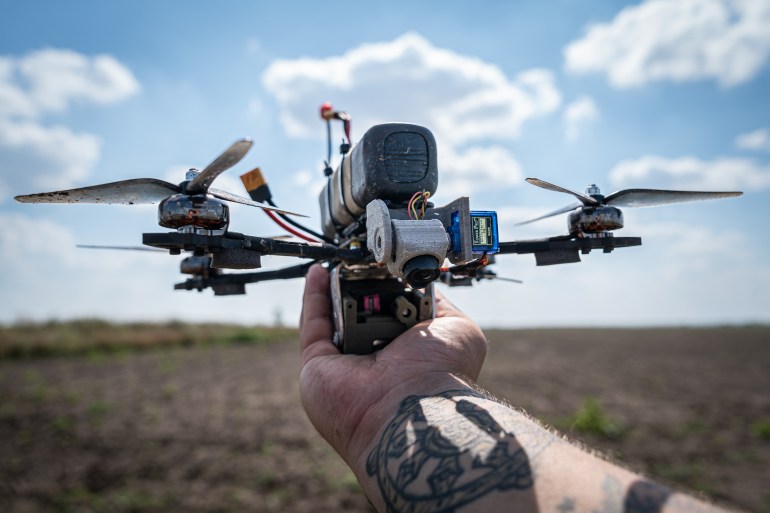 DONETSK OBLAST, UKRAINE - AUGUST 16: Ukrainian soldiers test homemade drones before sending them to the frontline as the Russia-Ukraine war continues in Donetsk Oblast, Ukraine on August 16, 2023. These drones, made of cheap electronics and 3d printed pieces can drop a 1.5 kg bomb. For the test exercise, the pilots attached a bottle of water. (Photo by Ignacio Marin/Anadolu Agency via Getty Images)