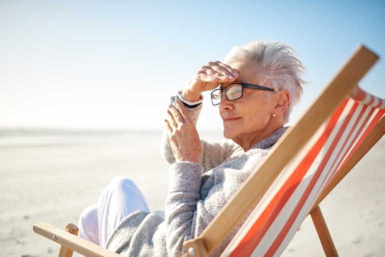 Shot of a senior woman spending a day at the beach