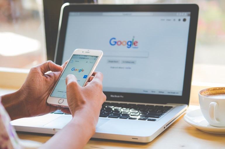 Bangkok. Thailand. January 24, 2016:A woman is typing on Google search engine from a laptop. Google is the ...