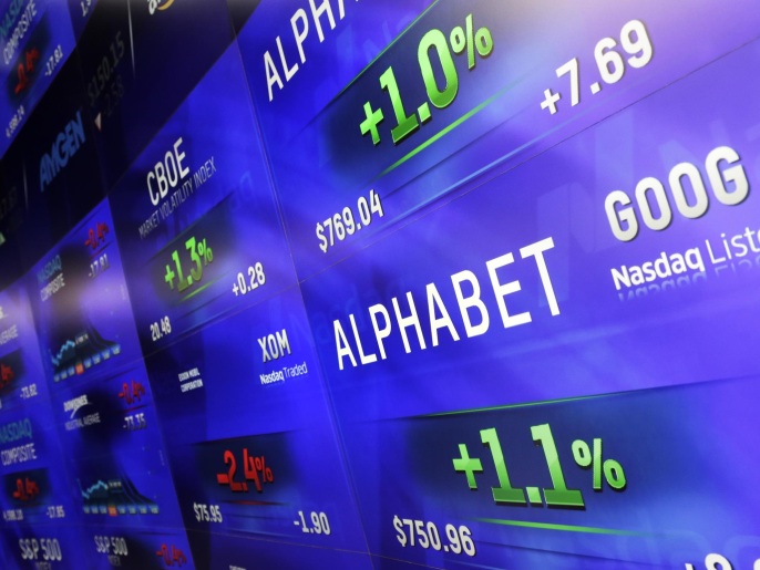 Electronic screens post prices of Alphabet stock, Monday, Feb. 1, 2016, at the Nasdaq MarketSite in New York. Alphabet, the parent company of Google, reports quarterly earnings Monday. (AP Photo/Mark Lennihan)