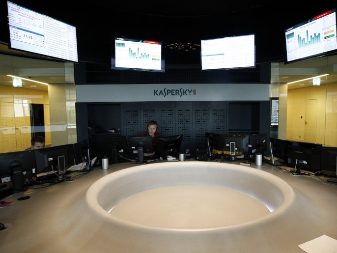 Employees work at the headquarters of Kaspersky Labs, a company which specialises in the production of antivirus and internet security software, in Moscow July 29, 2013. Picture taken July 29, 2013. REUTERS/Sergei Karpukhin (RUSSIA - Tags: SCIENCE TECHNOLOGY BUSINESS)