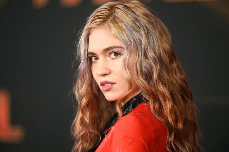 Canadian singer-songwriter Grimes (Claire Elise Boucher) attends the world premiere of "Captain Marvel" in Hollywood, California, on March 4, 2019. / AFP / Robyn Beck