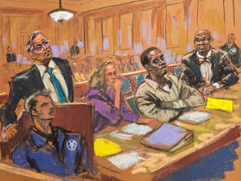 Defense lawyer Marc Agnifilo stands at the podium as Sean "Diddy" Combs and Alexandra Shapiro listen on the day of music mogul Sean "Diddy" Combs's hearing on his request to be released from jail pending trial in New York City, U.S., November 22, 2024 in this courtroom sketch. REUTERS/Jane Rosenberg REFILE - CORRECTING ID FROM "ALEXANDER" TO "ALEXANDRA