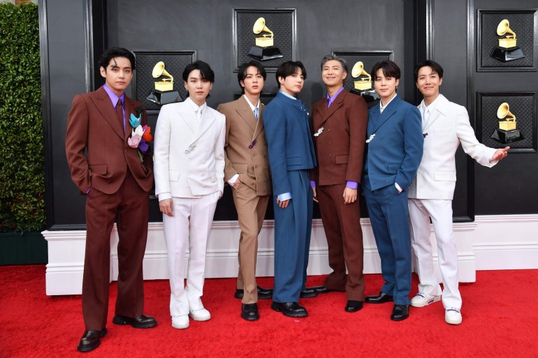 LAS VEGAS, NEVADA - APRIL 03: (L-R) V, Suga, Jin, Jungkook, RM, Jimin and J-Hope of BTS attends the 64th Annual GRAMMY Awards at MGM Grand Garden Arena on April 03, 2022 in Las Vegas, Nevada. (Photo by Axelle/Bauer-Griffin/FilmMagic)