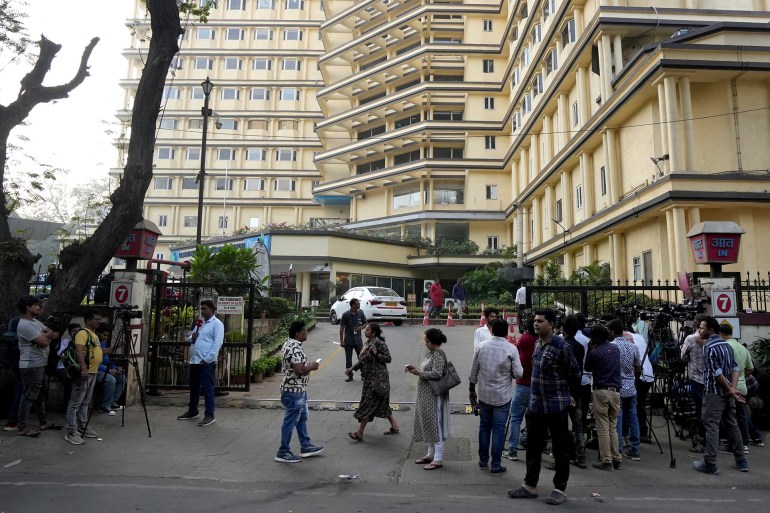 Media personnel work outside Lilavati hospital where Bollywood actor Saif Ali Khan underwent surgery after he was stabbed repeatedly by an intruder at his home, in Mumbai, India, January 16, 2025. REUTERS/Hemanshi Kamani